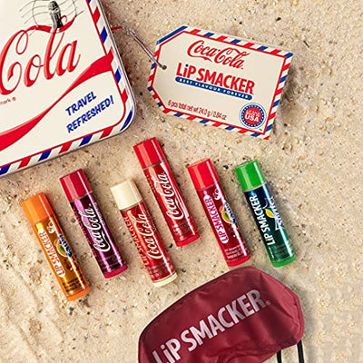 Lip Smacker Coca Cola Geschenkdose: Reiseset mit 6 Lippenpflegestiften in verschiedenen Geschmacksrichtungen + Schlafmaske - Geschenkapp